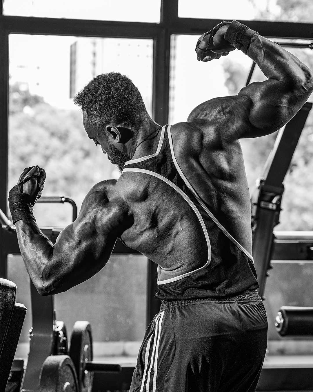 Coach William Dramatic Back Double Bicep Championship Conditioning